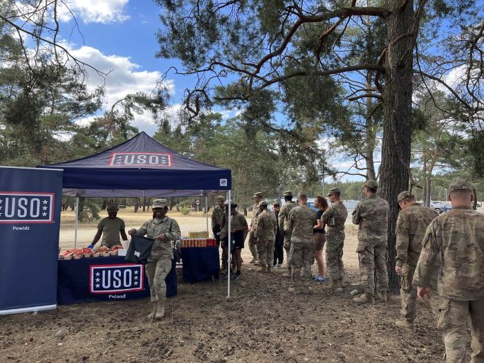 Service members at USO tent