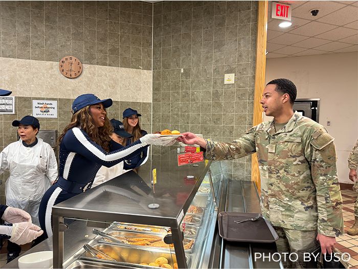 Dallas Cowboys Cheerleaders with service members