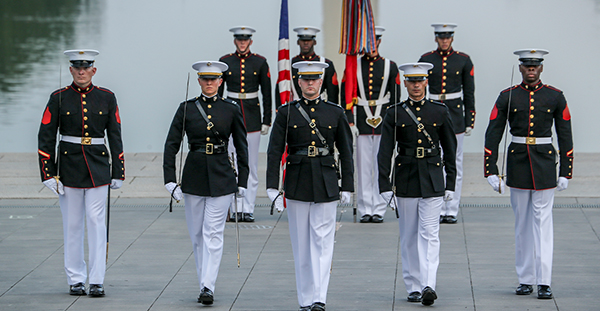 Service members in uniform.