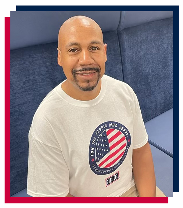 Photo of Brian Cowart in USO t-shirt