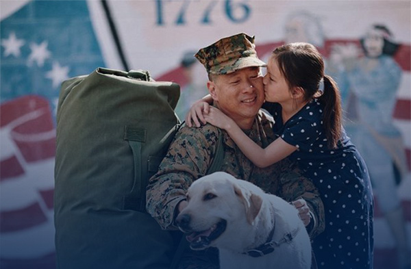 Service member reuniting with family