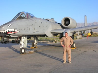 USO COO, retired Col. Christopher Plamp, with aircraft.