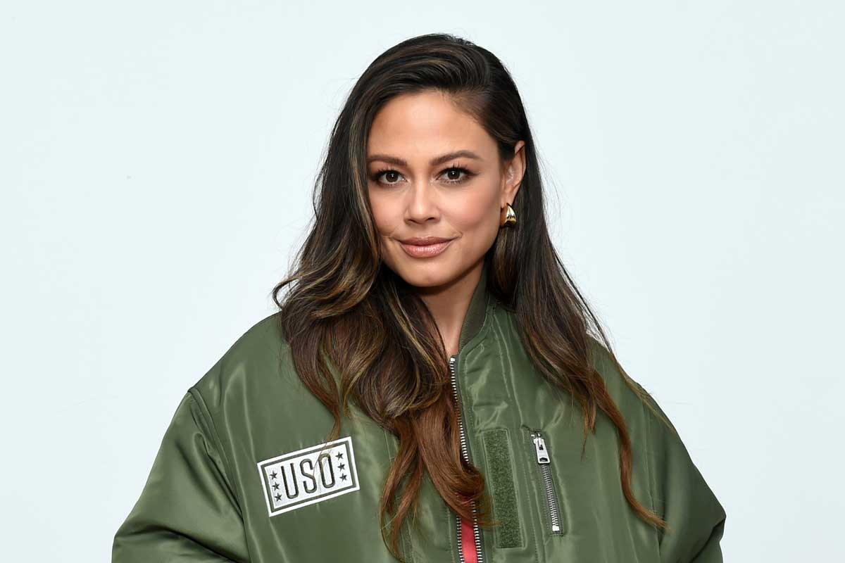 Photo of Vanessa Lachey in USO bomber jacket.