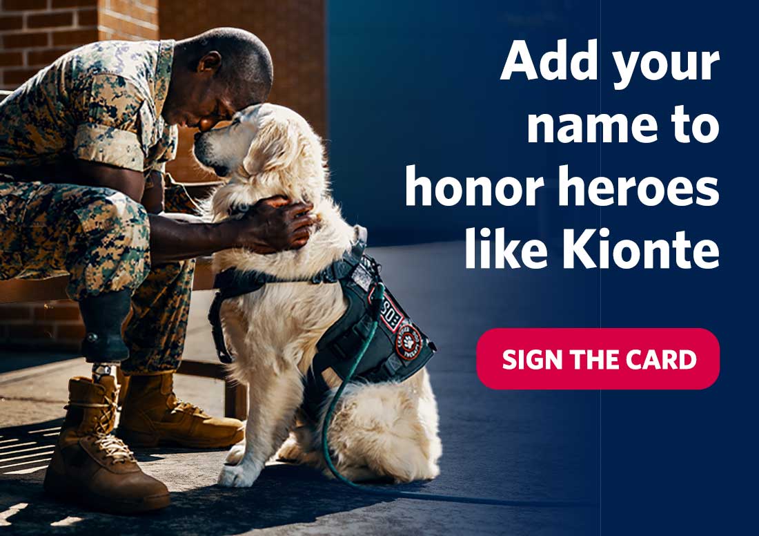 Retired Marine Corporal Kionte Storey with USO Canine