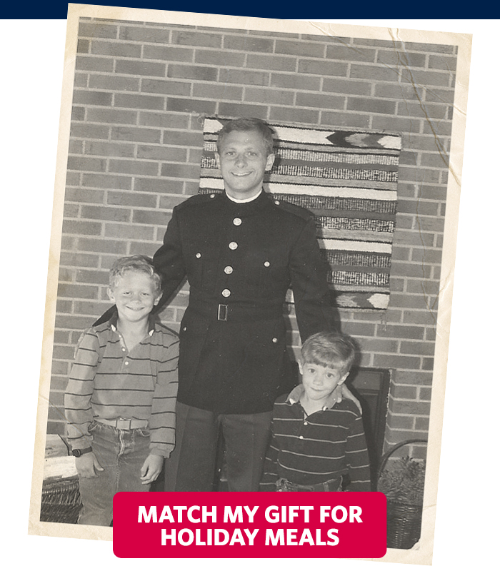 Brad Meuli stands with his two sons after returning from a long mission.