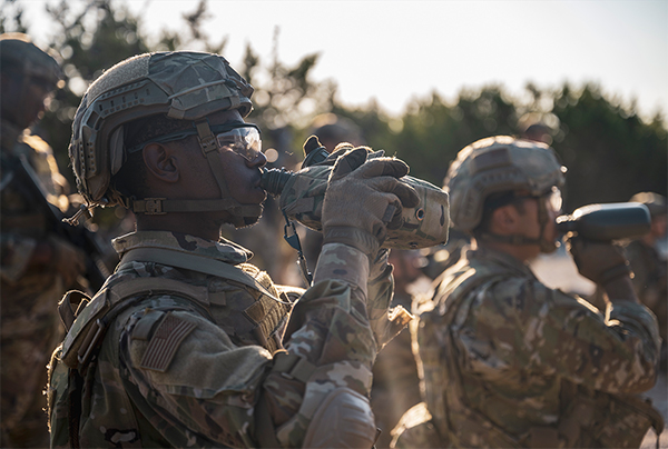 Service members drinking water