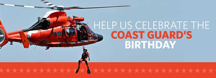 Image of Coast Guard helicopter and member of Coast Guard jumping from it