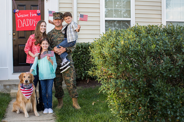 Service member reunited with family.