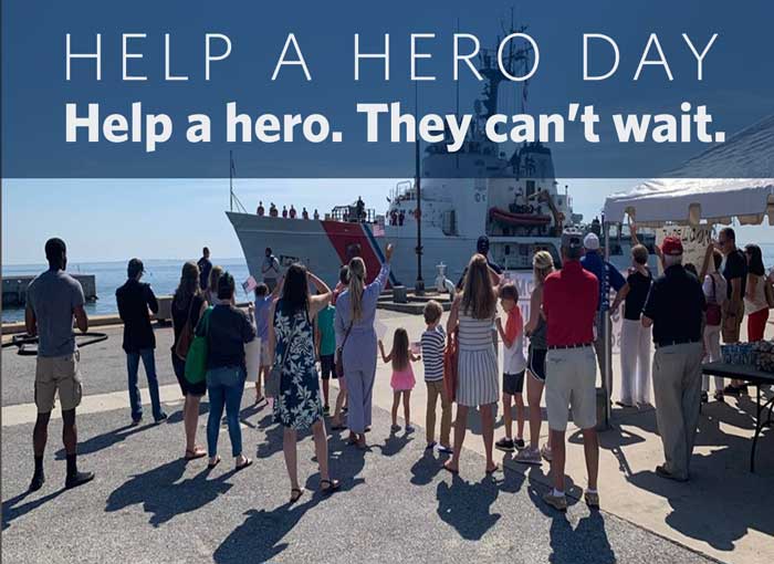 Volunteers greet returning service members.