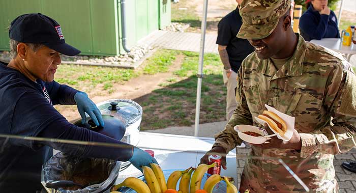 Service members enjoying a meal