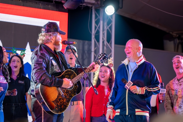 USO entertainers perform on stage USO entertainers perform on stage
