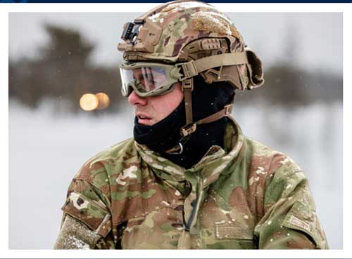 Service members in snow