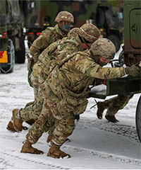 Service members at work